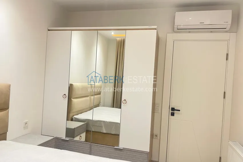 Приобрести Двухкомнатная квартира под ключ с двумя застекленными балконами в престижном комплексе - Махмутлар, Алания 10