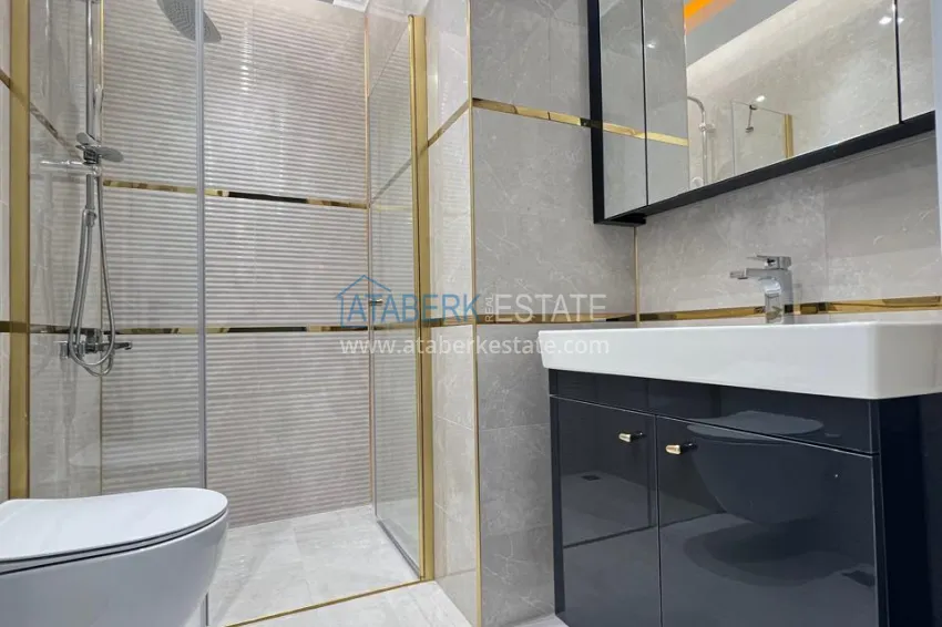 Приобрести Двухкомнатная квартира под ключ с двумя застекленными балконами в престижном комплексе - Махмутлар, Алания 11