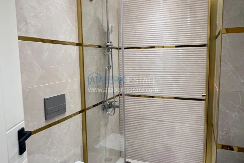 Приобрести Двухкомнатная квартира под ключ с двумя застекленными балконами в престижном комплексе - Махмутлар, Алания 12