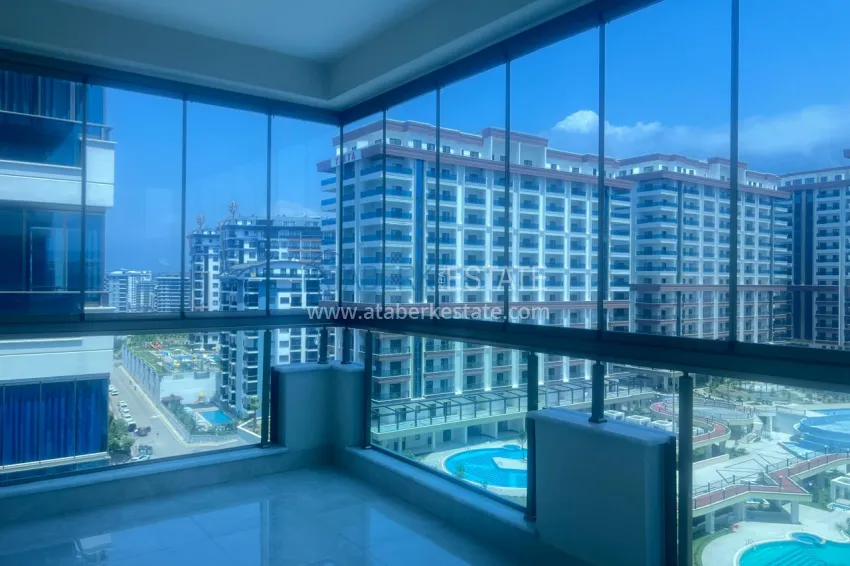 Приобрести Двухкомнатная квартира под ключ с двумя застекленными балконами в престижном комплексе - Махмутлар, Алания 13