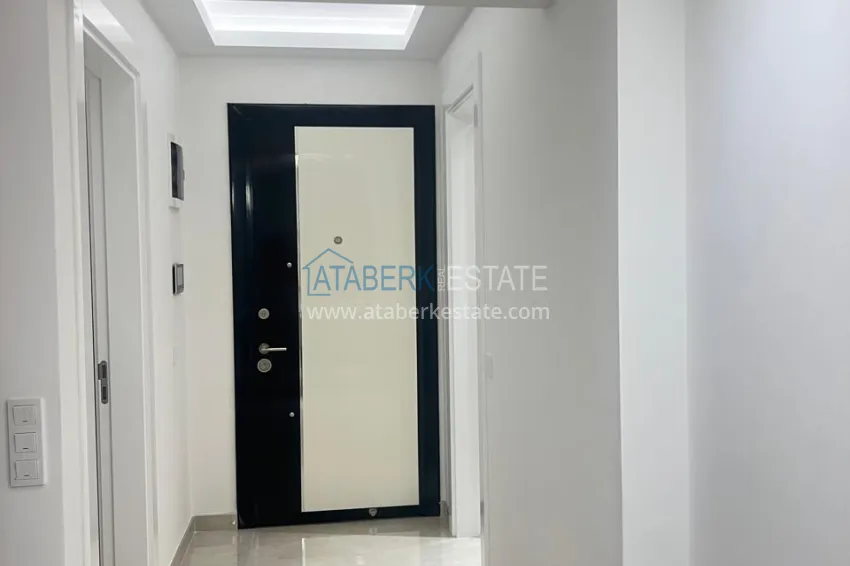 Приобрести Двухкомнатная квартира под ключ с двумя застекленными балконами в престижном комплексе - Махмутлар, Алания 1