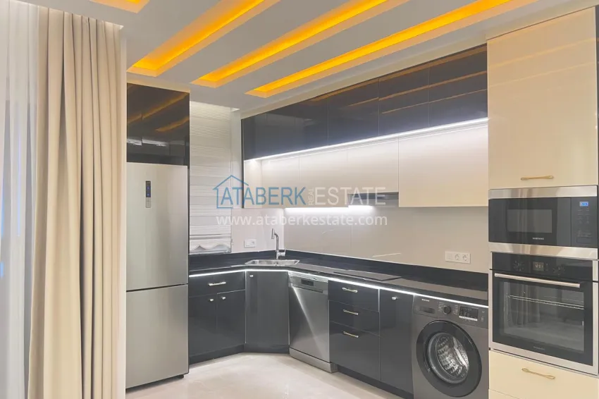 Приобрести Двухкомнатная квартира под ключ с двумя застекленными балконами в престижном комплексе - Махмутлар, Алания 3