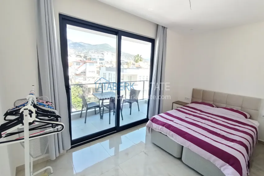 Приобрести Двухуровневый пентхаус в центре Алании – с видом на горы, 250 метров до пляжа 4 