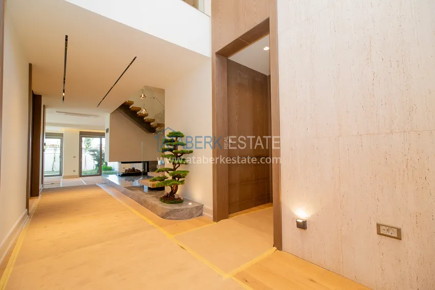 Приобрести Современные виллы в Анталии, район Лара - собственный бассейн, сад и идеальная локация 1 