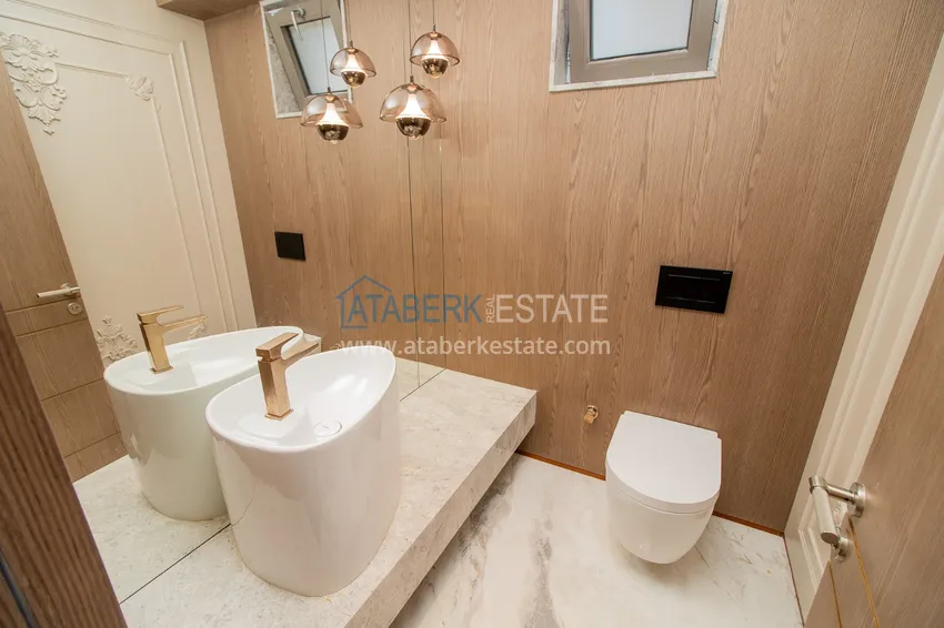 Приобрести Современные виллы в Анталии, район Лара - собственный бассейн, сад и идеальная локация 4 