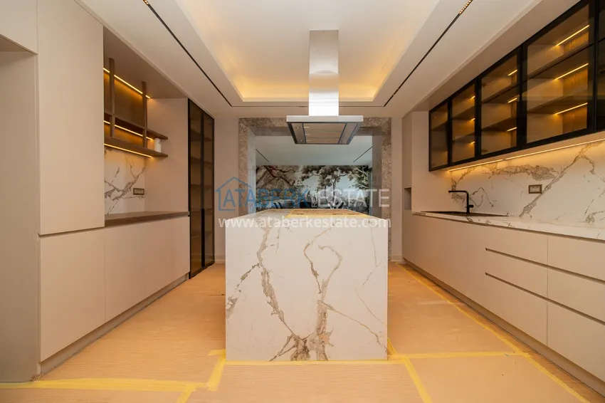 Приобрести Современные виллы в Анталии, район Лара - собственный бассейн, сад и идеальная локация 9 