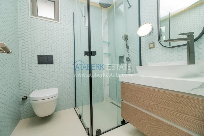 Приобрести Современные виллы в Анталии, район Лара - собственный бассейн, сад и идеальная локация 34 