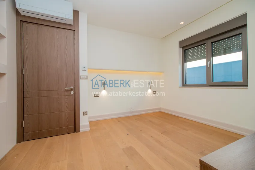 Приобрести Современные виллы в Анталии, район Лара - собственный бассейн, сад и идеальная локация 36 