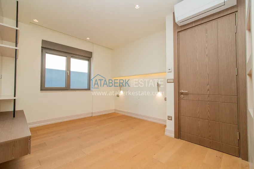 Приобрести Современные виллы в Анталии, район Лара - собственный бассейн, сад и идеальная локация 39 