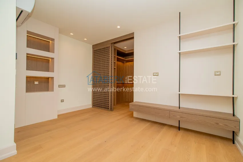 Приобрести Современные виллы в Анталии, район Лара - собственный бассейн, сад и идеальная локация 41 