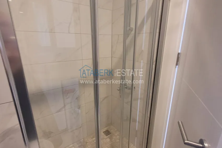 Приобрести Квартира 1+1 в Алании, район Махмутларе - в современном жилом комплексе 12 