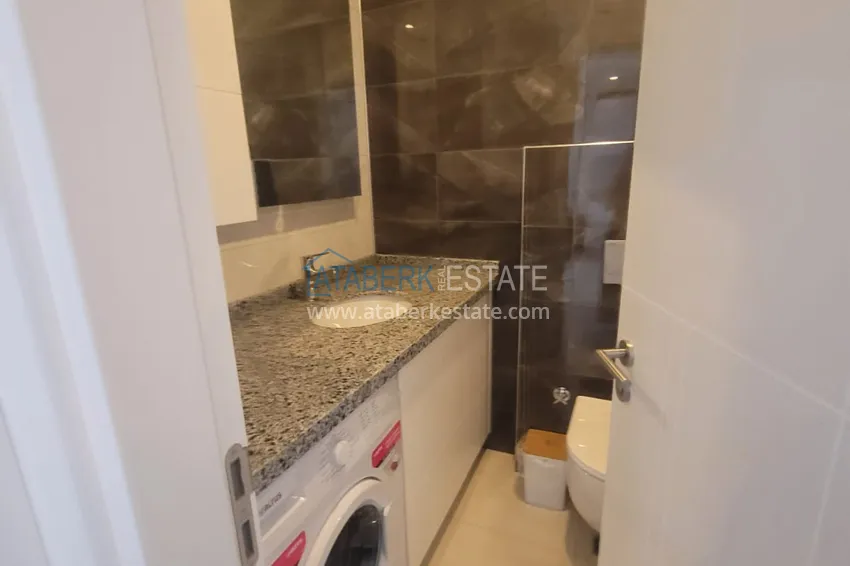 Приобрести Квартира 1+1 в Алании, район Махмутларе - в современном жилом комплексе 15 