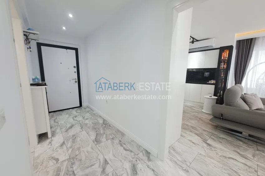 Приобрести Квартира 2+1 на первой линии в Алании, район Махмутлар - подходит под гражданство 1 