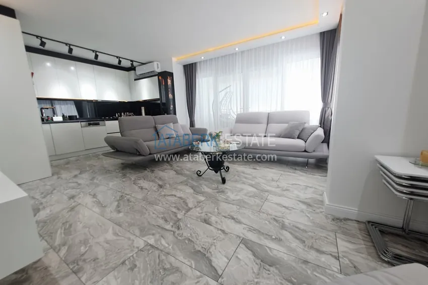 Приобрести Квартира 2+1 на первой линии в Алании, район Махмутлар - подходит под гражданство 3 