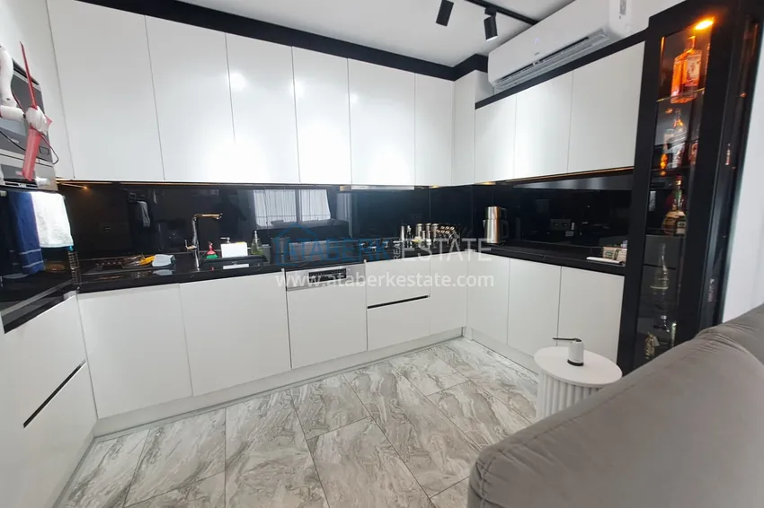 Приобрести Квартира 2+1 на первой линии в Алании, район Махмутлар - подходит под гражданство 5 