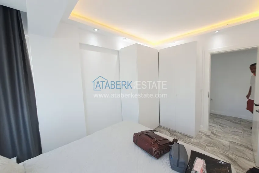 Приобрести Квартира 2+1 на первой линии в Алании, район Махмутлар - подходит под гражданство 10 