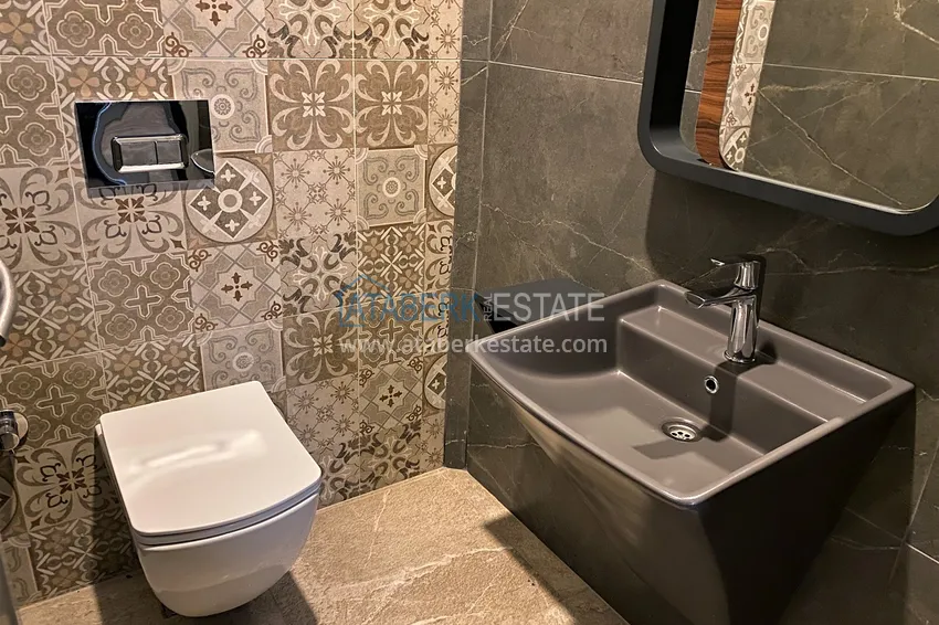 Квартира 2+1 на первой береговой линии в Махмутларе — готовый вариант с видом на море 24 