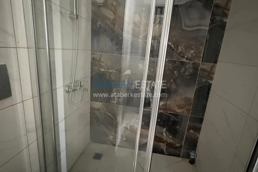 Приобрести Новая квартира 1+1 в Махмутларе, Алания — новостройка с видом на горы 11 