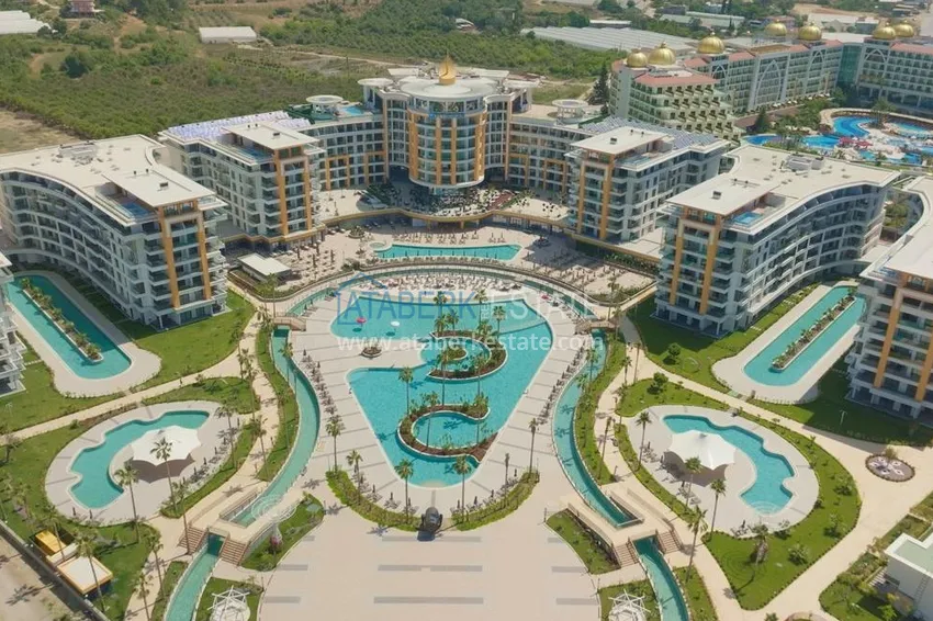 Квартира 1+1 в Алании, район Тюрклер – 85 м², первичная недвижимость в пятизвёздочном резорте 1 