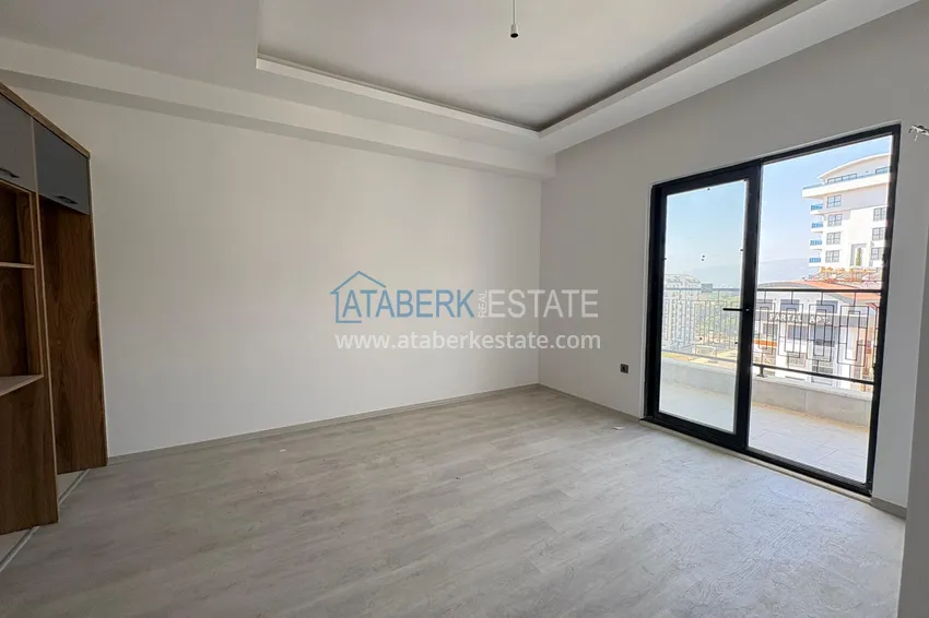 Приобрести Новая квартира 1+1 в Махмутларе, Алания — новостройка с видом на горы 3 