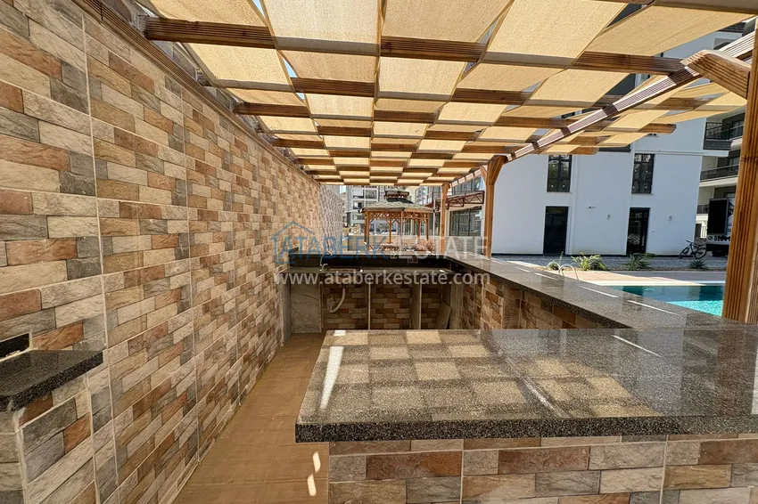 Новая квартира 1+1 в Махмутларе, Алания — новостройка с видом на горы 9 