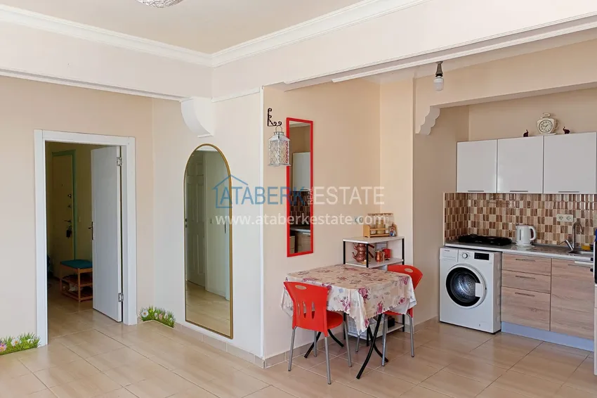 Приобрести Двухкомнатная квартира в Махмутларе, Алания - с мебелью, вид на море, первая береговая 13 