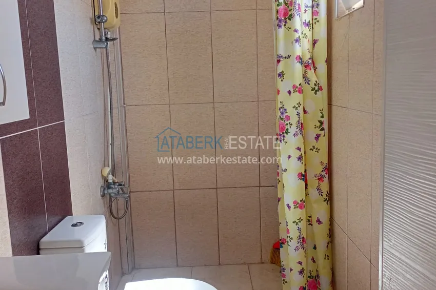 Приобрести Двухкомнатная квартира в Махмутларе, Алания - с мебелью, вид на море, первая береговая 18 