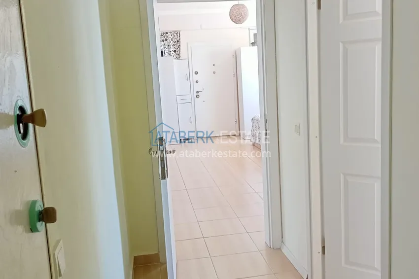 Приобрести Двухкомнатная квартира в Махмутларе, Алания - с мебелью, вид на море, первая береговая 2 