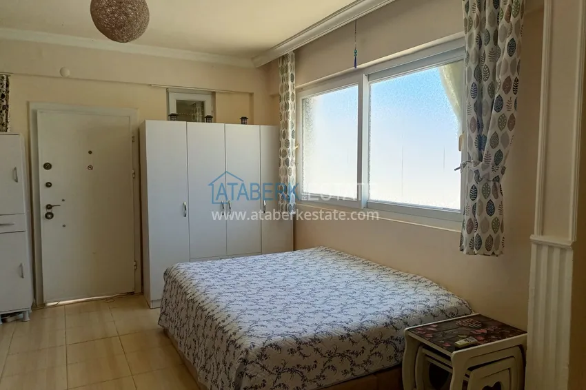 Приобрести Двухкомнатная квартира в Махмутларе, Алания - с мебелью, вид на море, первая береговая 4 