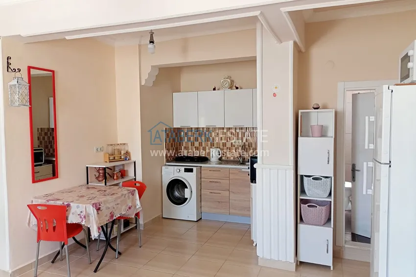 Приобрести Двухкомнатная квартира в Махмутларе, Алания - с мебелью, вид на море, первая береговая 7 