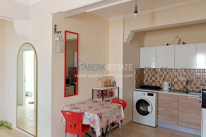 Приобрести Двухкомнатная квартира в Махмутларе, Алания - с мебелью, вид на море, первая береговая 9 