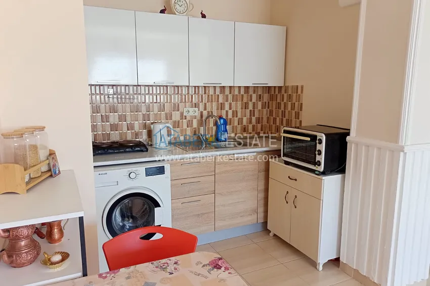 Приобрести Двухкомнатная квартира в Махмутларе, Алания - с мебелью, вид на море, первая береговая 10 