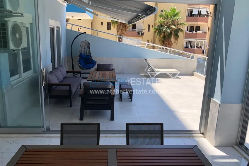 Приобрести Квартира 2+1 с террасой 70 м² в Алании, район Махмутлар - с мебелью и видом на море  3 