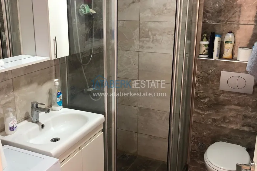Приобрести Квартира 2+1 с террасой 70 м² в Алании, район Махмутлар - с мебелью и видом на море  9 