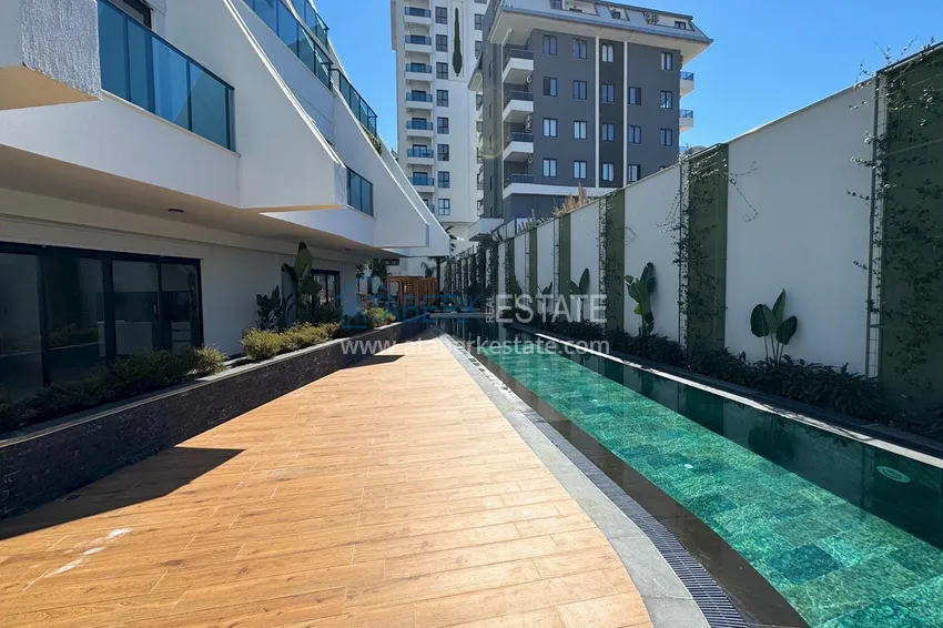 Новый многоквартирный жилой комплекс комфорт-класса в Махмутларе 13