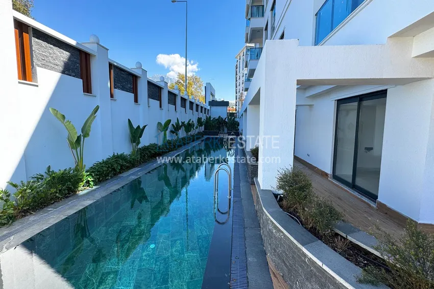 Новый многоквартирный жилой комплекс комфорт-класса в Махмутларе 14