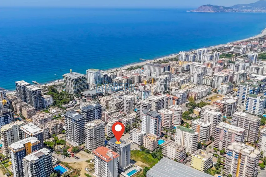 Новая квартира 2+1 в Махмутларе — в центре района, всего 300 м от моря 1 
