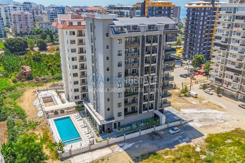 Новая квартира 2+1 в Махмутларе — в центре района, всего 300 м от моря 3 