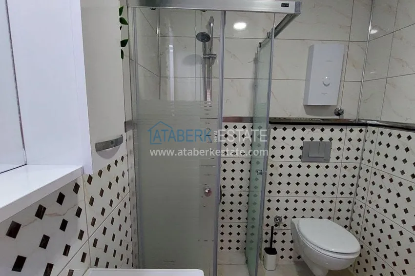 Приобрести Трёхкомнатная квартира с мебелью в Махмутларе - всего 250 метров от моря 12