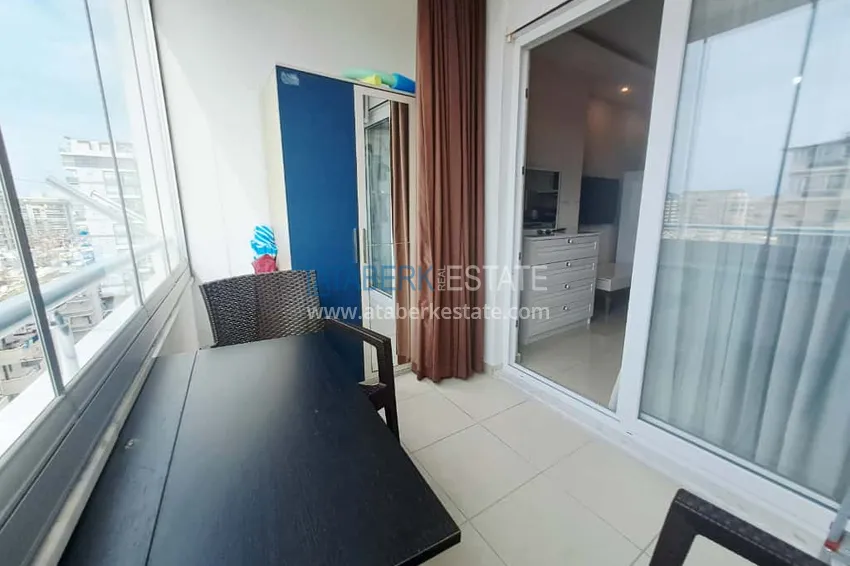 Приобрести Квартира-студия под ключ в Махмутларе, Алания - с видом на море  7 