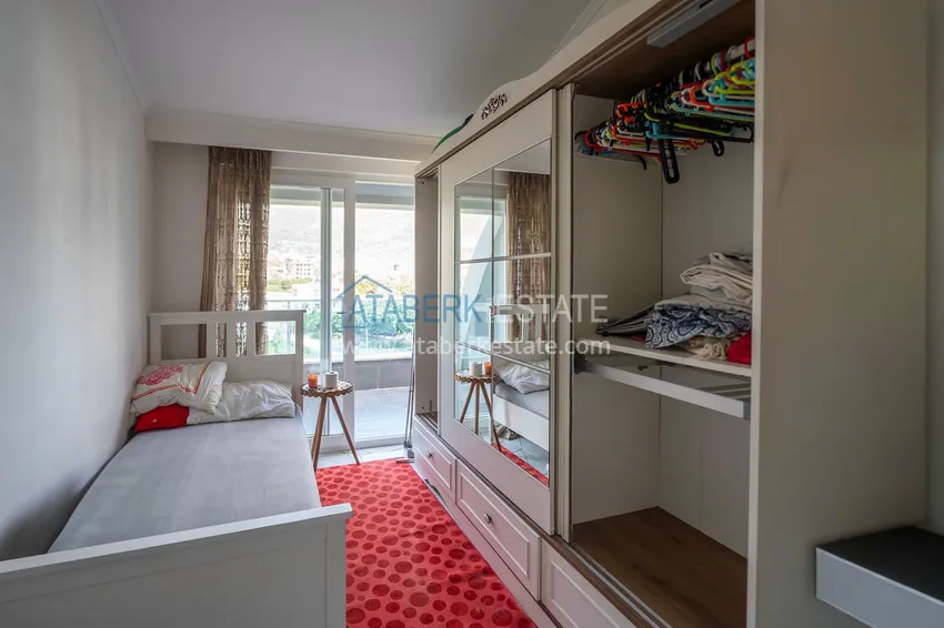 Приобрести Двухуровневая квартира 2+1 с мебелью и видом на горы в Алании, район Оба 10 