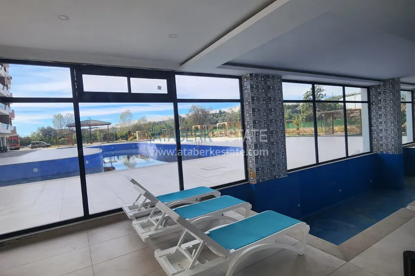 Квартира 1+1 с мебелью от собственника в Махмутларе — ЖК с сервисом уровня отеля и частным пляжем 10 