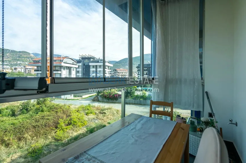 Приобрести Двухуровневая квартира 2+1 с мебелью и видом на горы в Алании, район Оба 14 