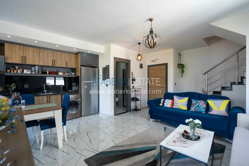 Приобрести Двухуровневая квартира 2+1 с мебелью и видом на горы в Алании, район Оба 1 