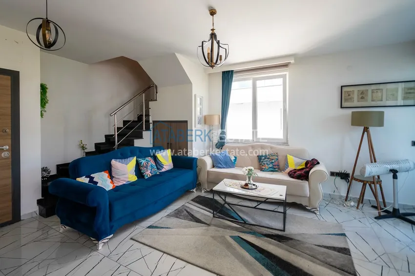 Приобрести Двухуровневая квартира 2+1 с мебелью и видом на горы в Алании, район Оба 2 