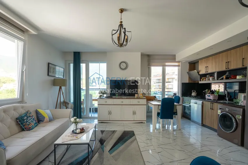 Приобрести Двухуровневая квартира 2+1 с мебелью и видом на горы в Алании, район Оба 4 