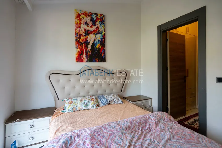 Приобрести Двухуровневая квартира 2+1 с мебелью и видом на горы в Алании, район Оба 7 