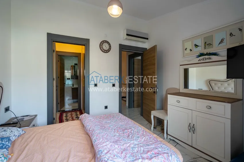 Приобрести Двухуровневая квартира 2+1 с мебелью и видом на горы в Алании, район Оба 8 