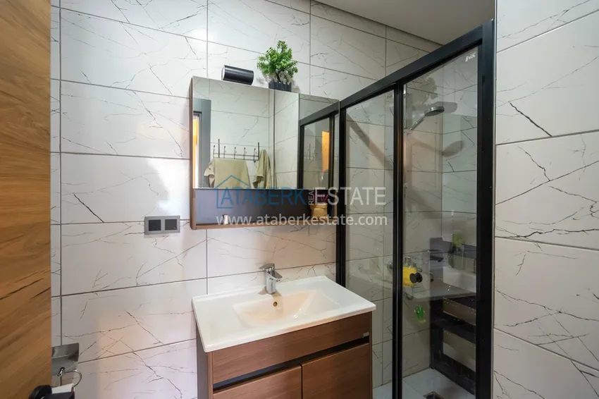 Приобрести Двухуровневая квартира 2+1 с мебелью и видом на горы в Алании, район Оба 9 