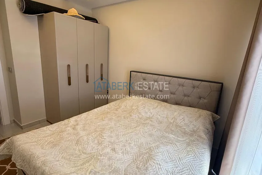 Приобрести Квартира 1+1 с мебелью от собственника в Махмутларе — ЖК с сервисом уровня отеля и частным пляжем 11 